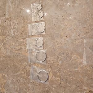 3 pairs or s9.25 sterling silver earrings 20,30and 40 mm I got them for gf